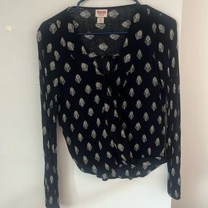 Black and white patterned blouse